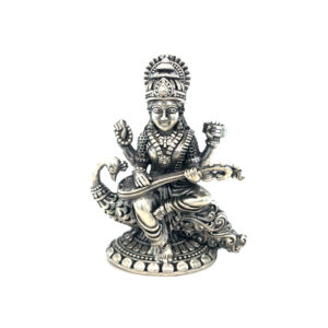 Silver Idol of Goddess Saraswati Seated on Majestic Peacock Silver Idol of Goddess Saraswati Seated on Majestic Peacock